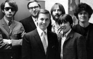 1260/KYA's Johnny Holliday (center) and Chris Edwards (second from left) meet Michael Nesmith, Peter Tork, Davy Jones and Micky Dolenz of The Monkees
