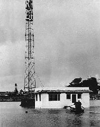 The flooded KRE Radio Building (Photo)